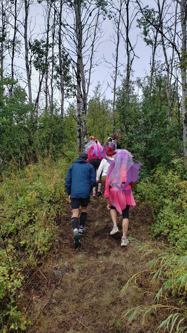 Costumed runners on trail