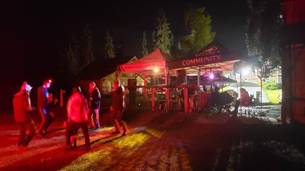 Night hub with lights and tents