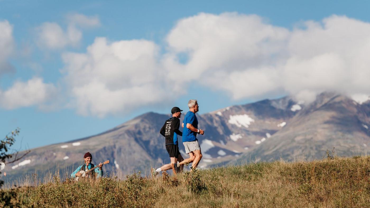 Runners crossing the ridge