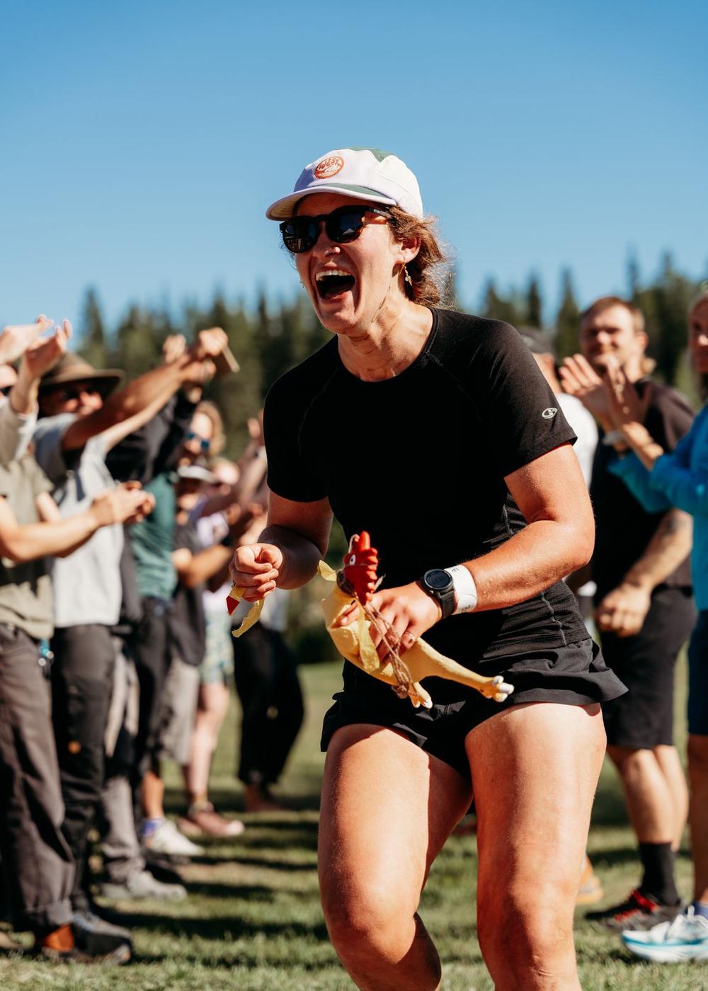 Runner celebrating at the finish